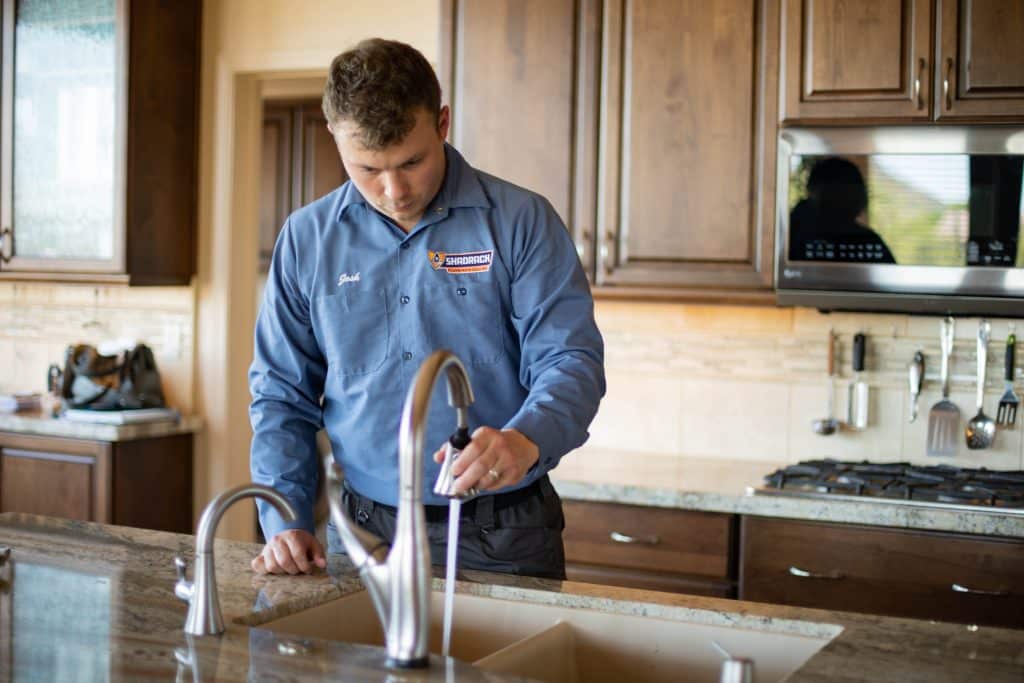 Shadrach fixing clogged sink drain